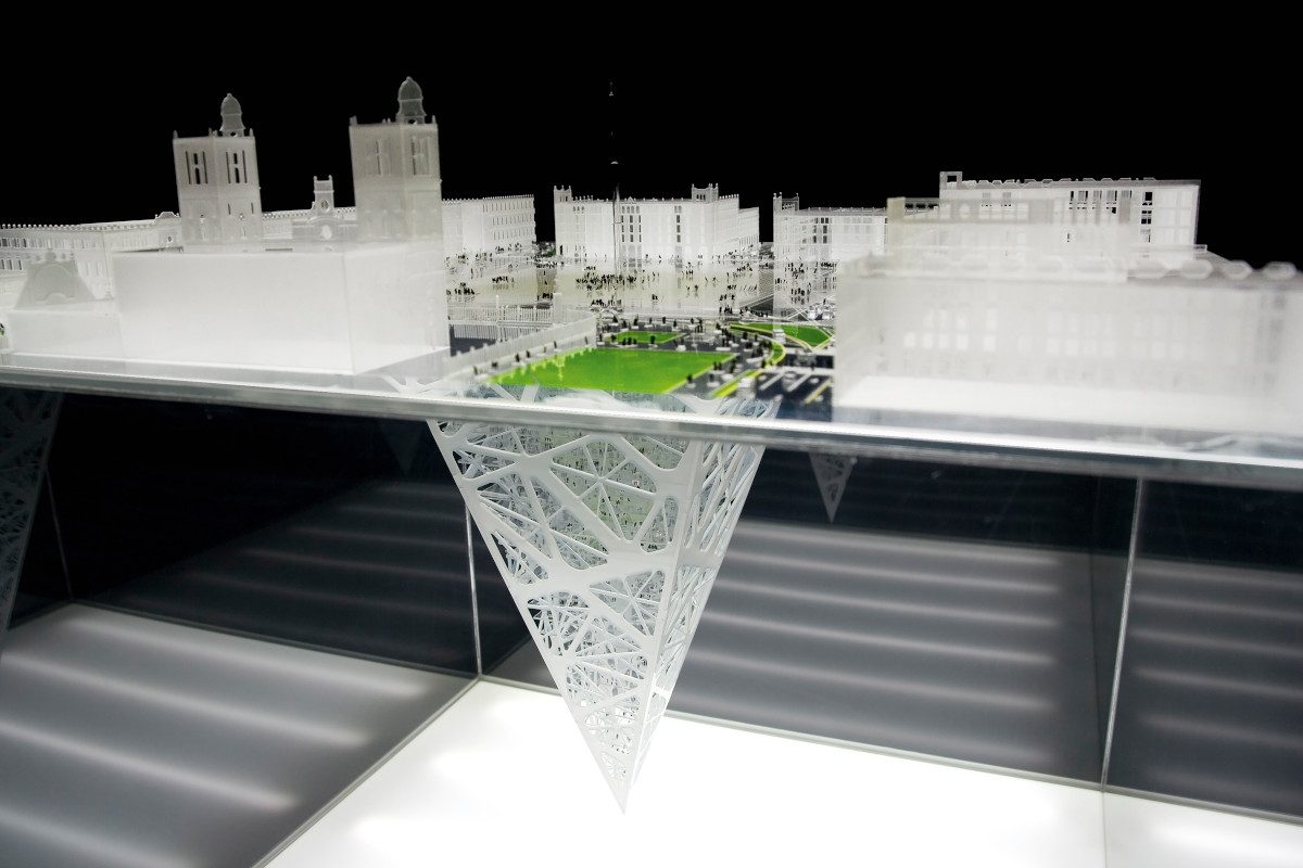 A model of the 'earth scraper' Architects design 65-storey upside down 'earth scraper' pyramid