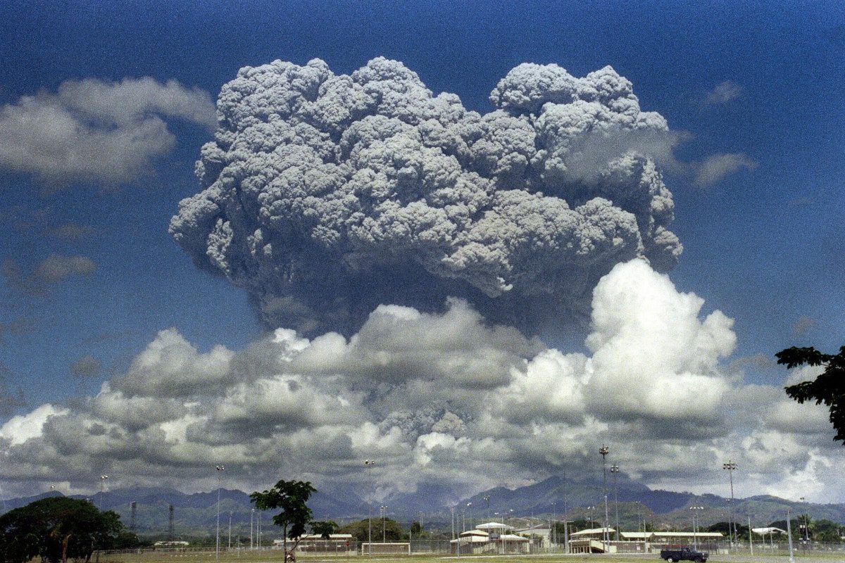 A massive cloud of dust arises from an eruption