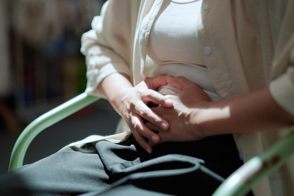 Woman feeling hurt at stomach