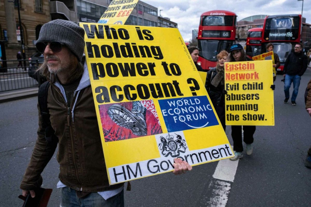Photo of anti-government protesters in London, holding signs about Epstein, banking and other economic issues