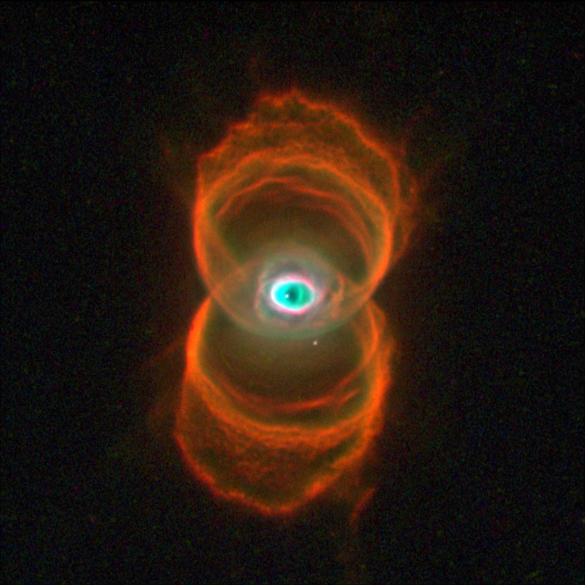 A Nebula shaped like an eye with a red ring above and below it