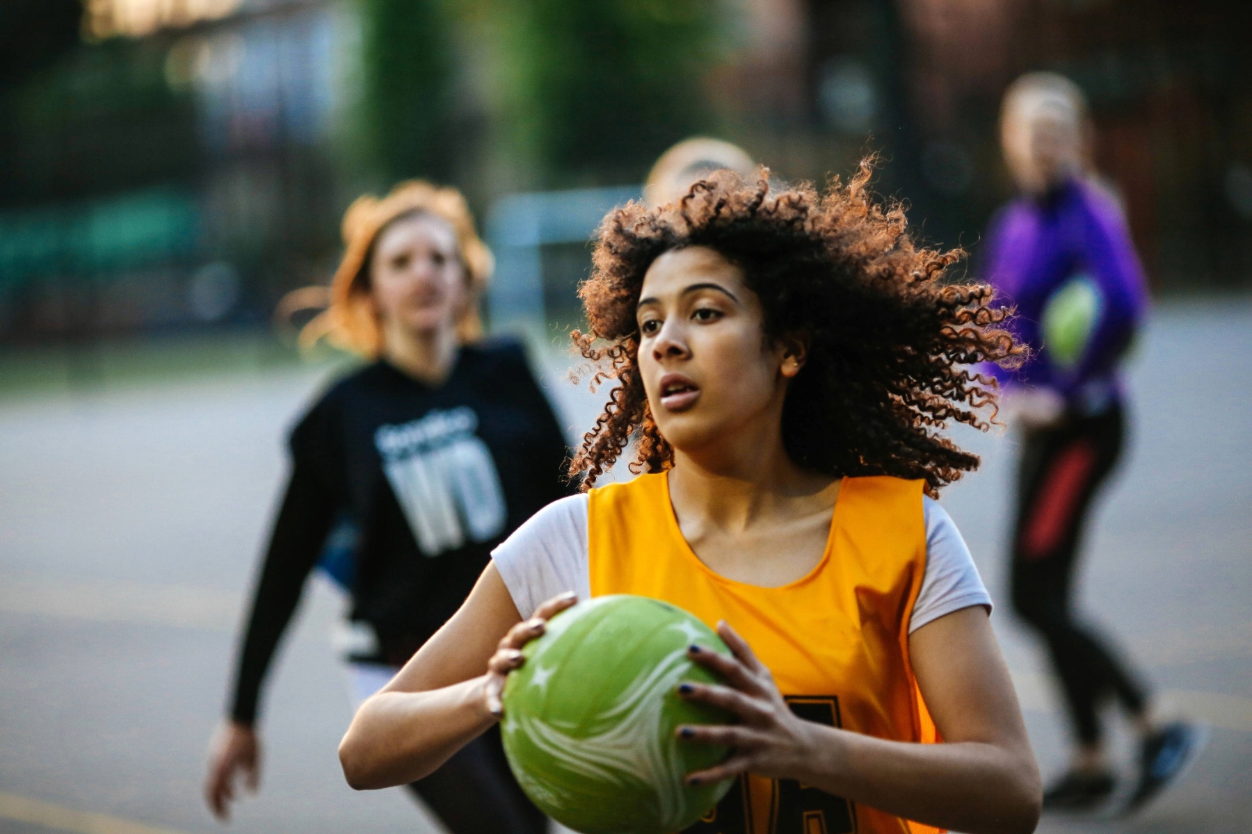 Girl playing netball