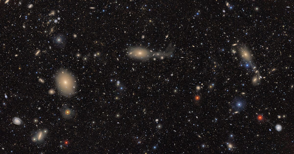 a expansive image showing a variety of different coloured galaxy and stars of varying sizes.