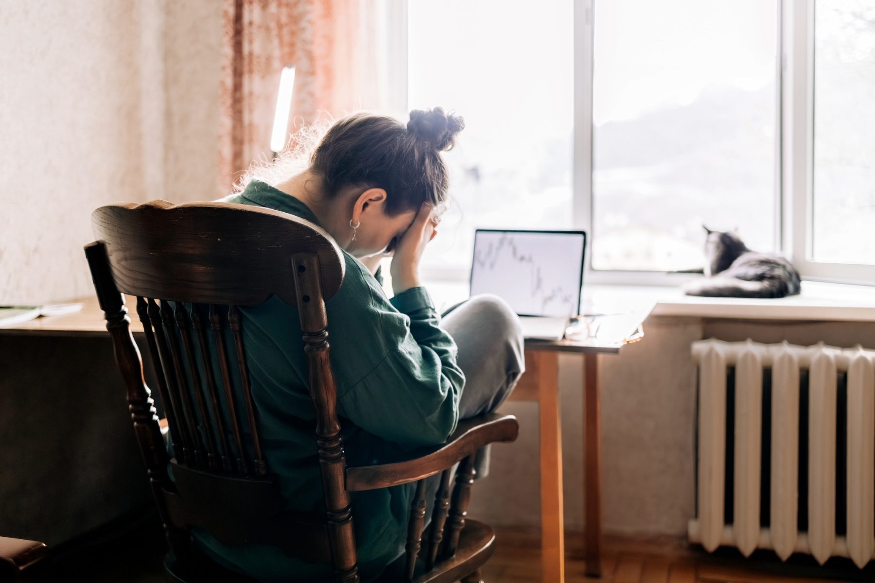 Sad woman at a desk