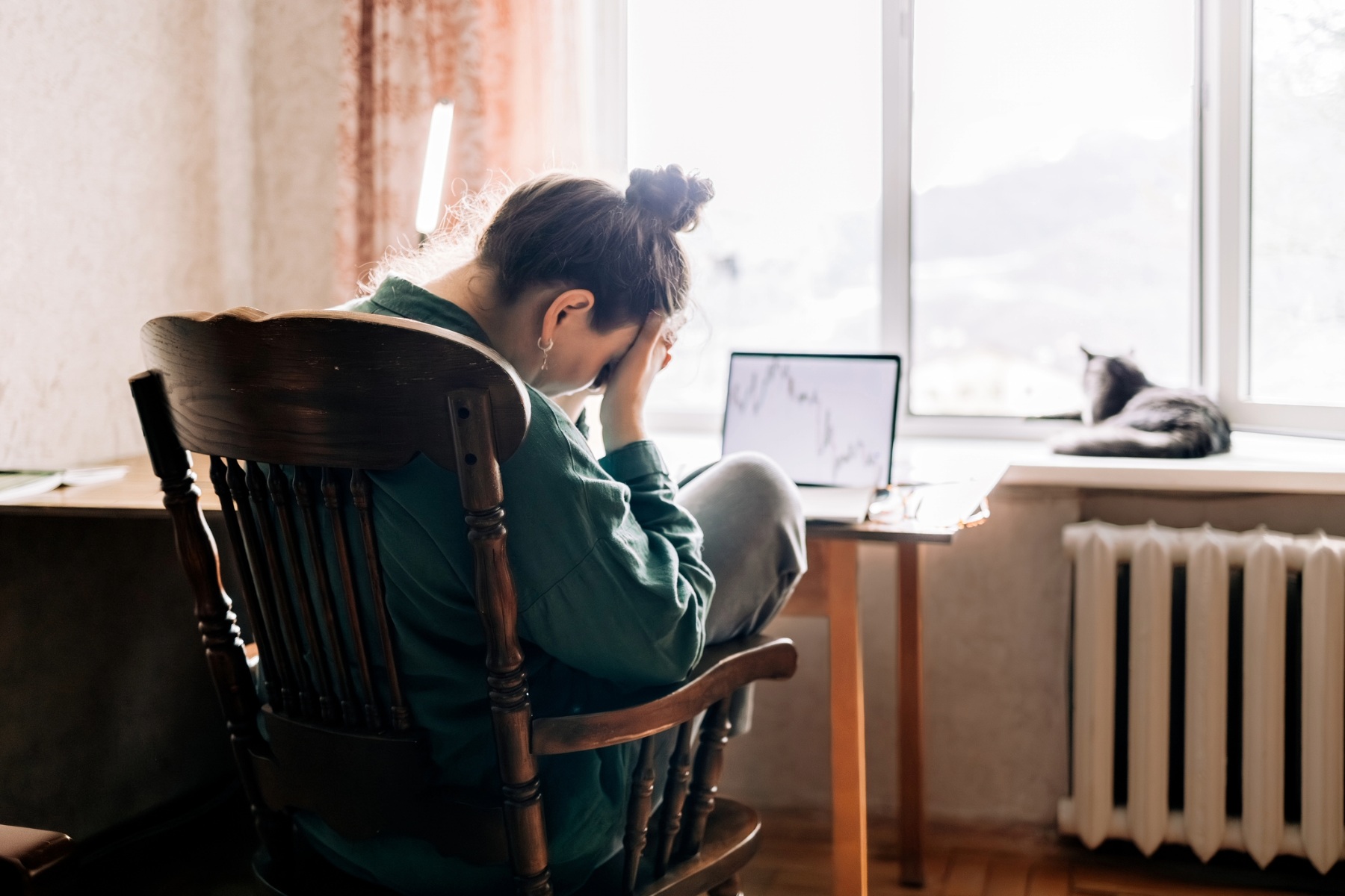 Sad woman at a desk