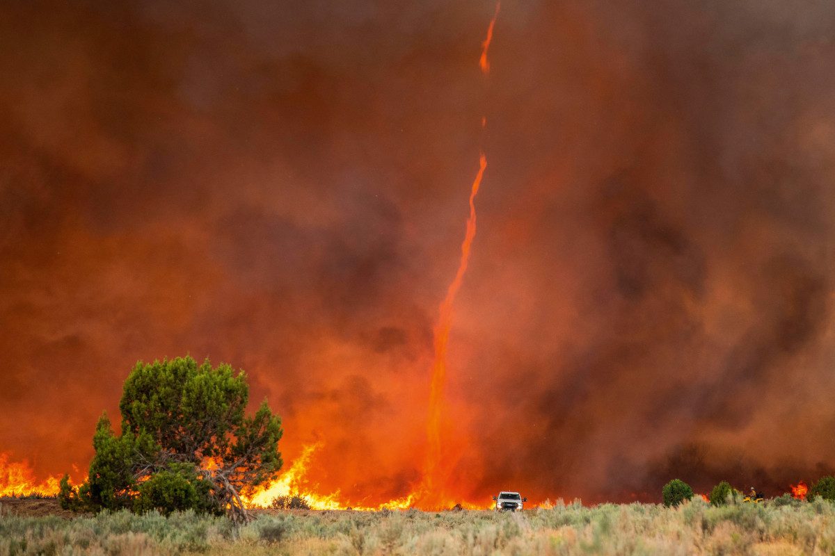A fire devil or fire tornado rises out of intense flames at the Pine Gulch Fire on the Western Slope during August 2, 2020 near Grand Junction, Colorado