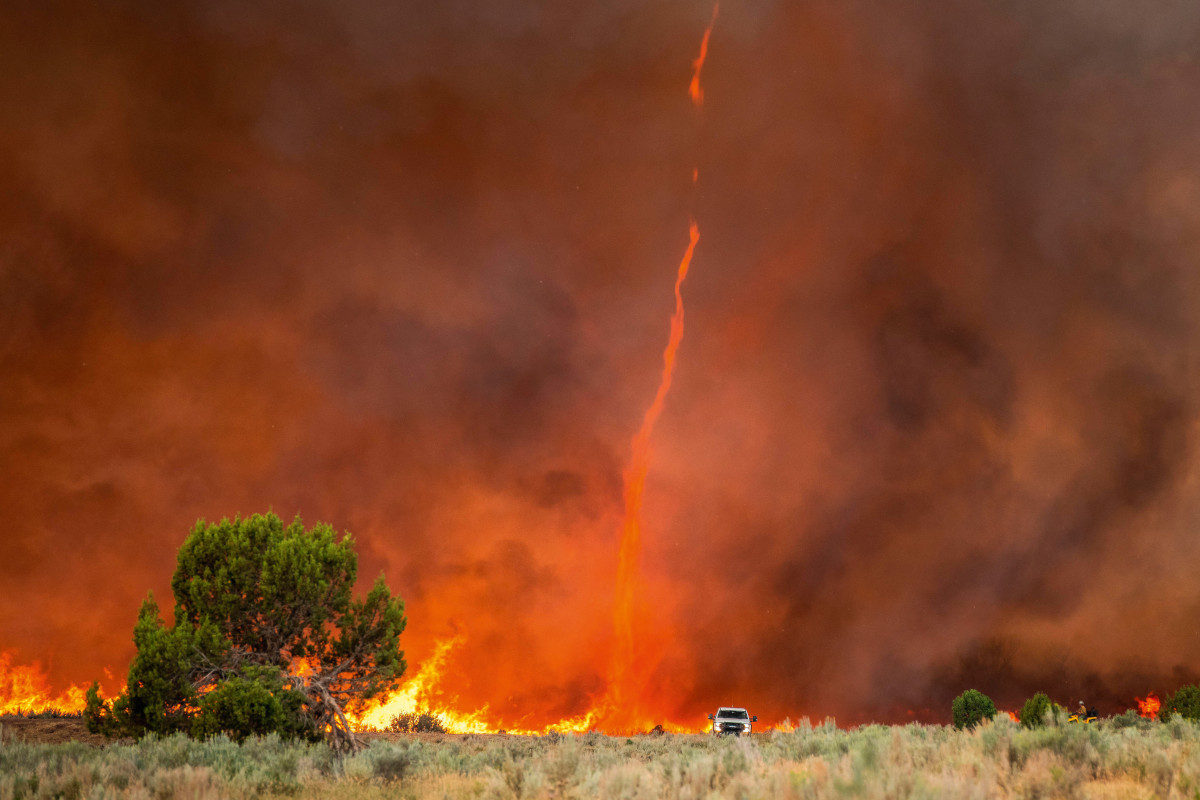 A fire devil or fire tornado rises out of intense flames at the Pine Gulch Fire on the Western Slope during August 2, 2020 near Grand Junction, Colorado