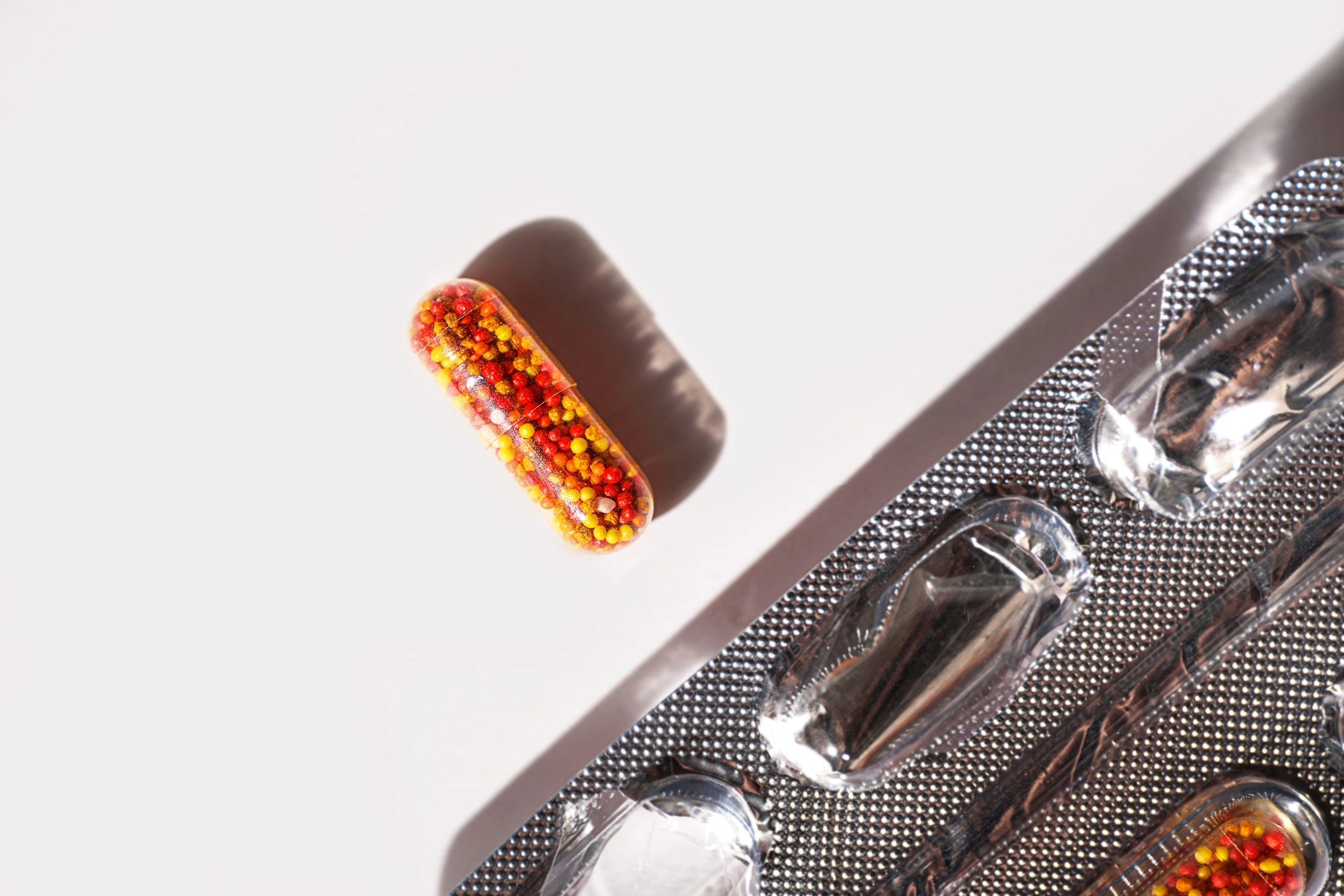Vitamin pills along with the packet.