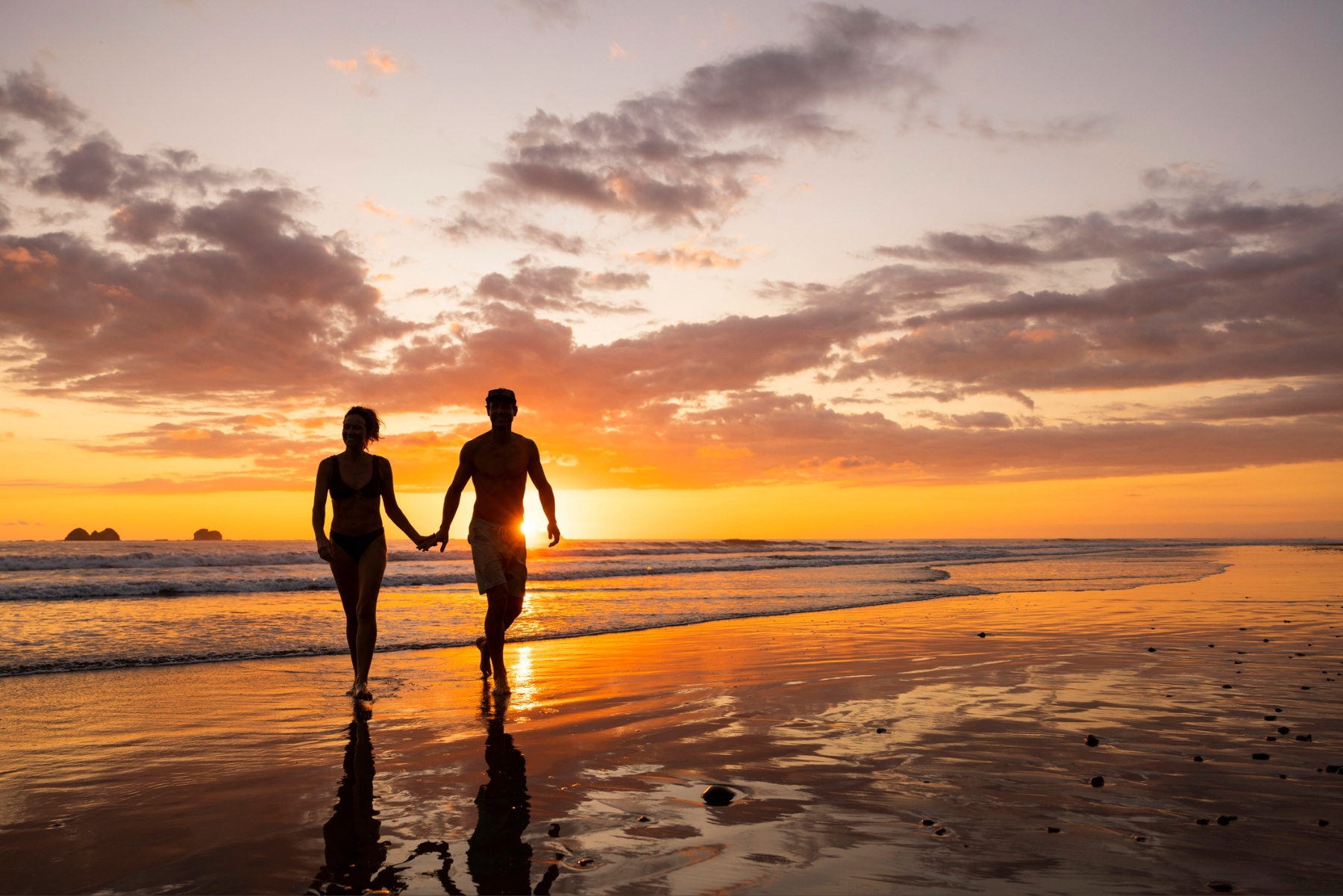 Couple walking into the sunset