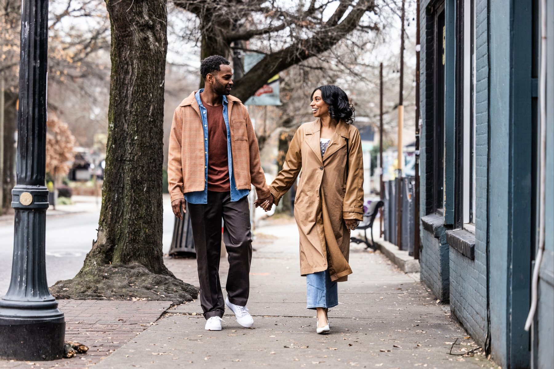 Couple walking down street