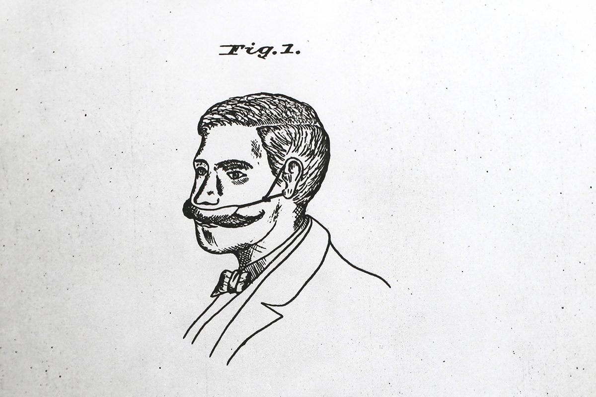 An ingenious mustache shield for a mess-free dining experience.