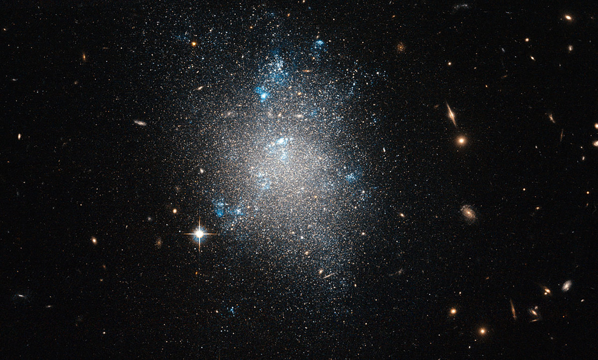 An archetypal dwarf galaxy, NCG-5477