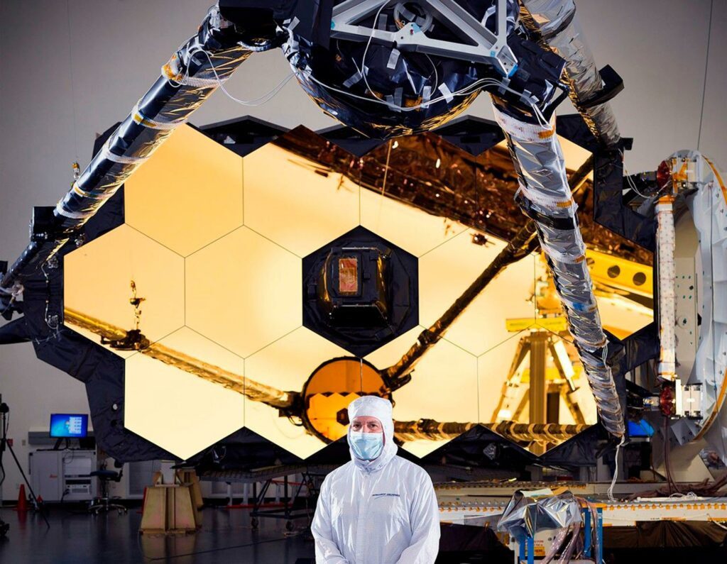 Optical Telescope Element Manager, Lee Feinberg, standing in front of the James Webb Space Telescope