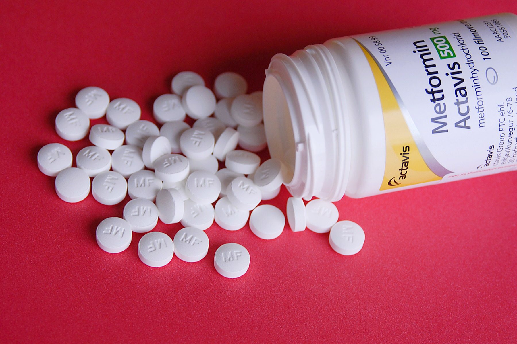Bottle with pills spilling out