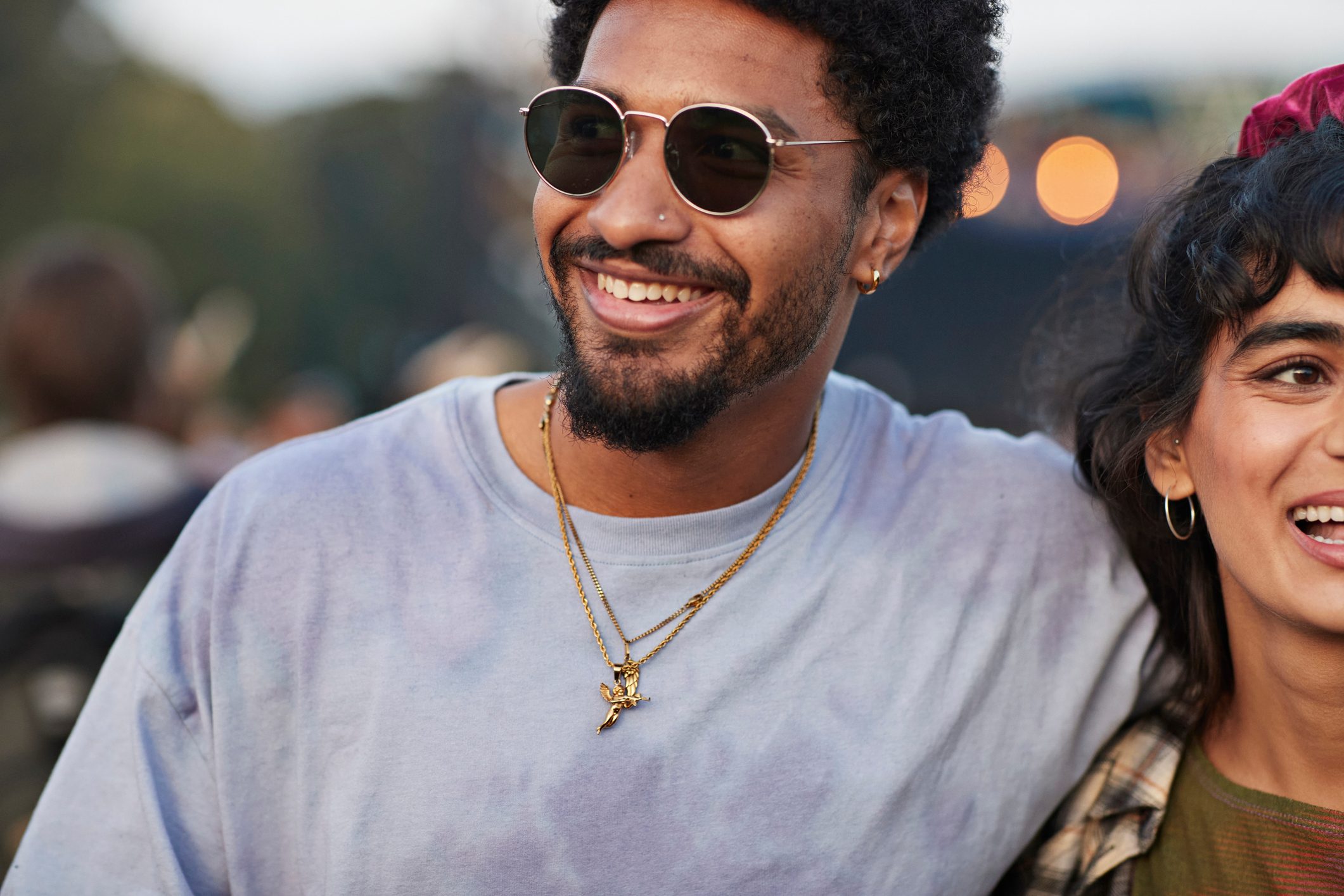 Happy young man wearing sunglasses