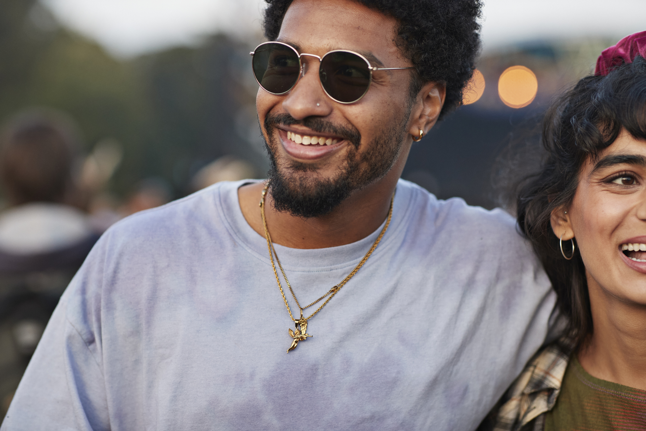 Happy young man wearing sunglasses