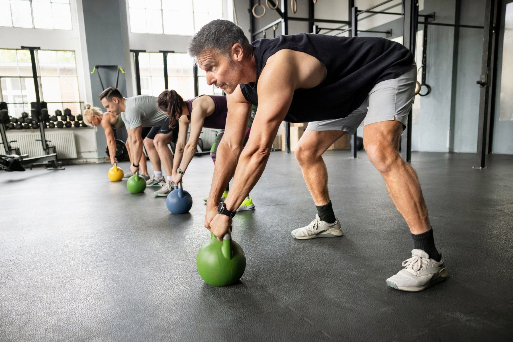 Men exercising in a gym