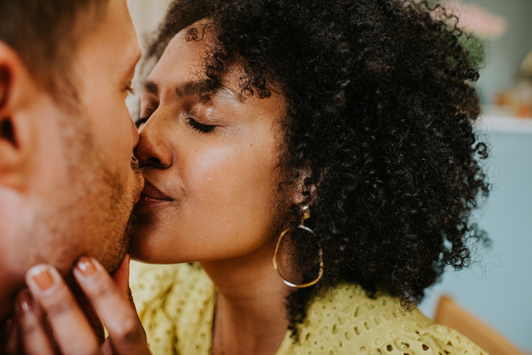 Two people kissing.
