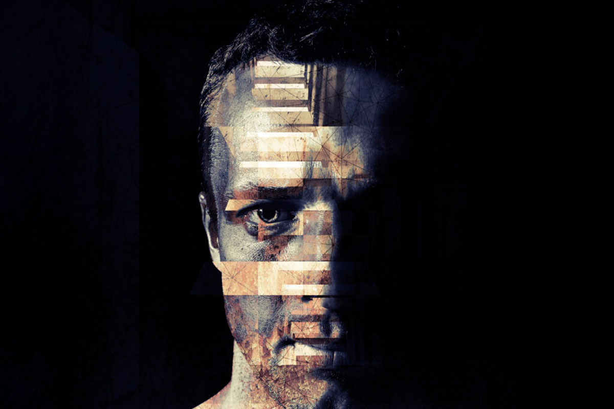 A face obscured in darkness.