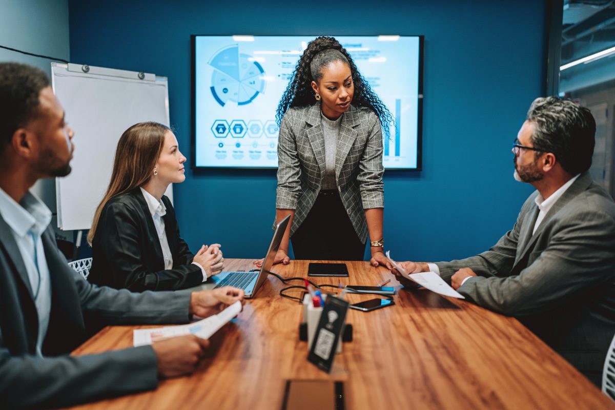 Photo of a business woman leading a meeting
