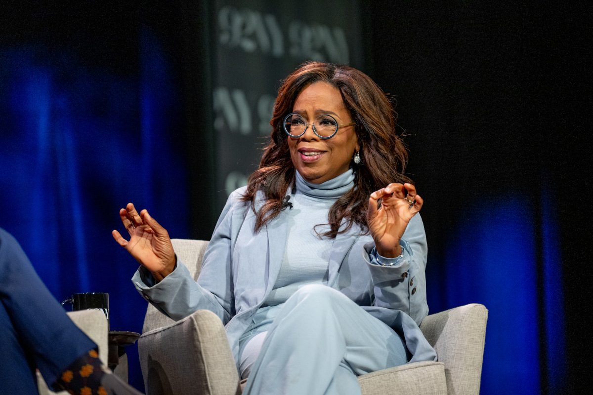 Oprah Winfrey sat talking