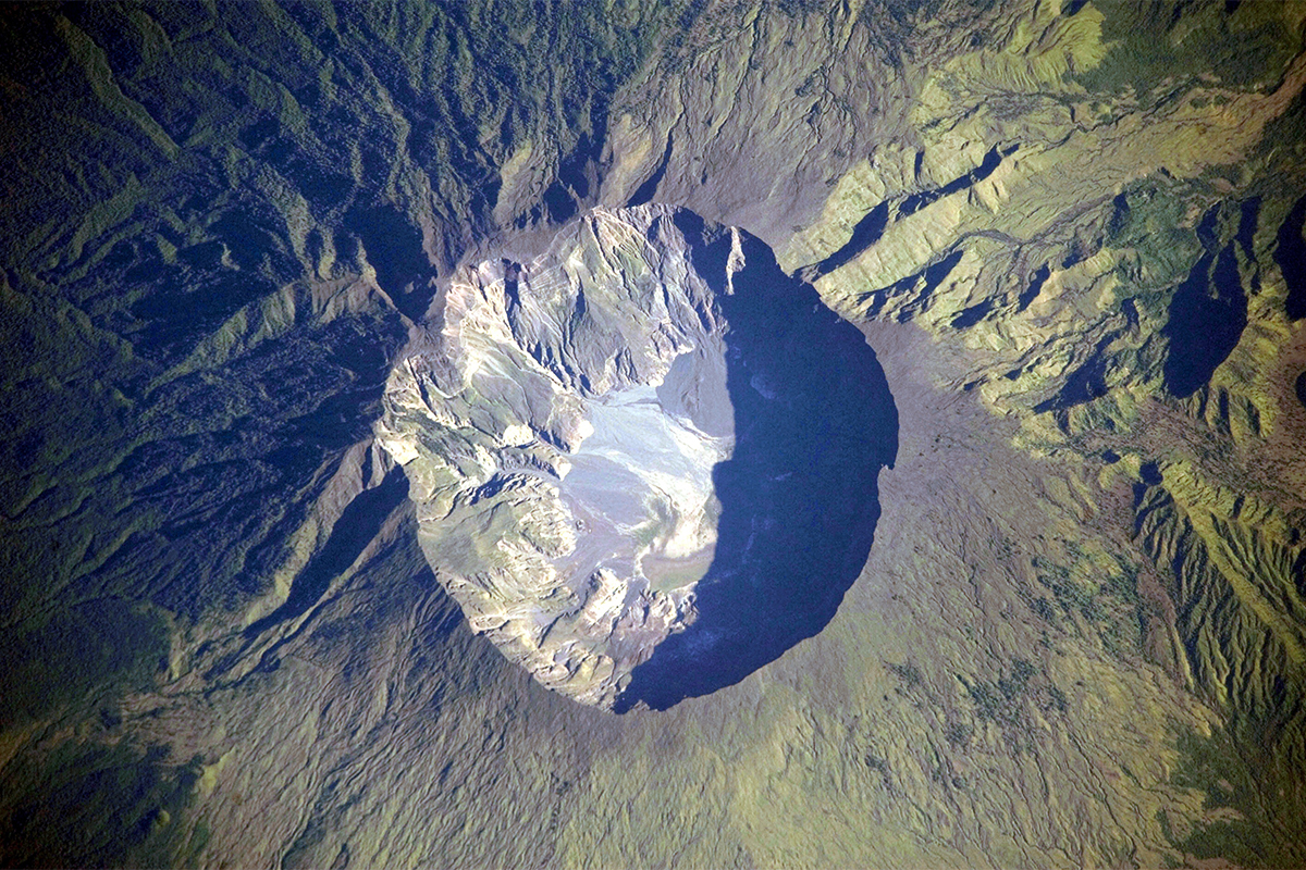 Aerial view of volcano crater.