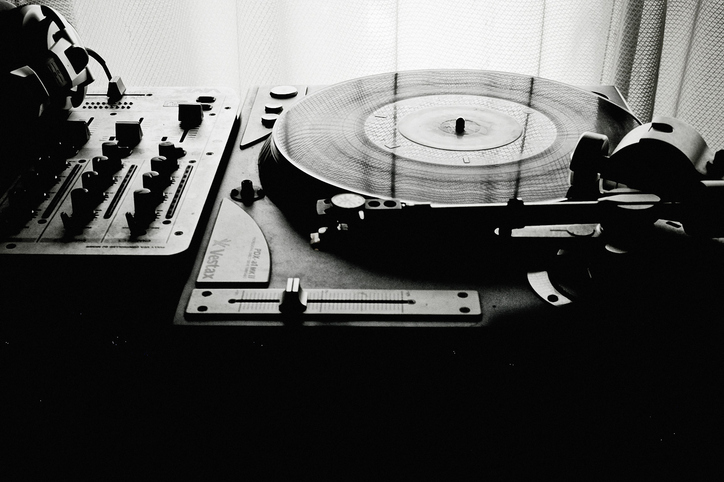 Vinyl record spinning on record player.