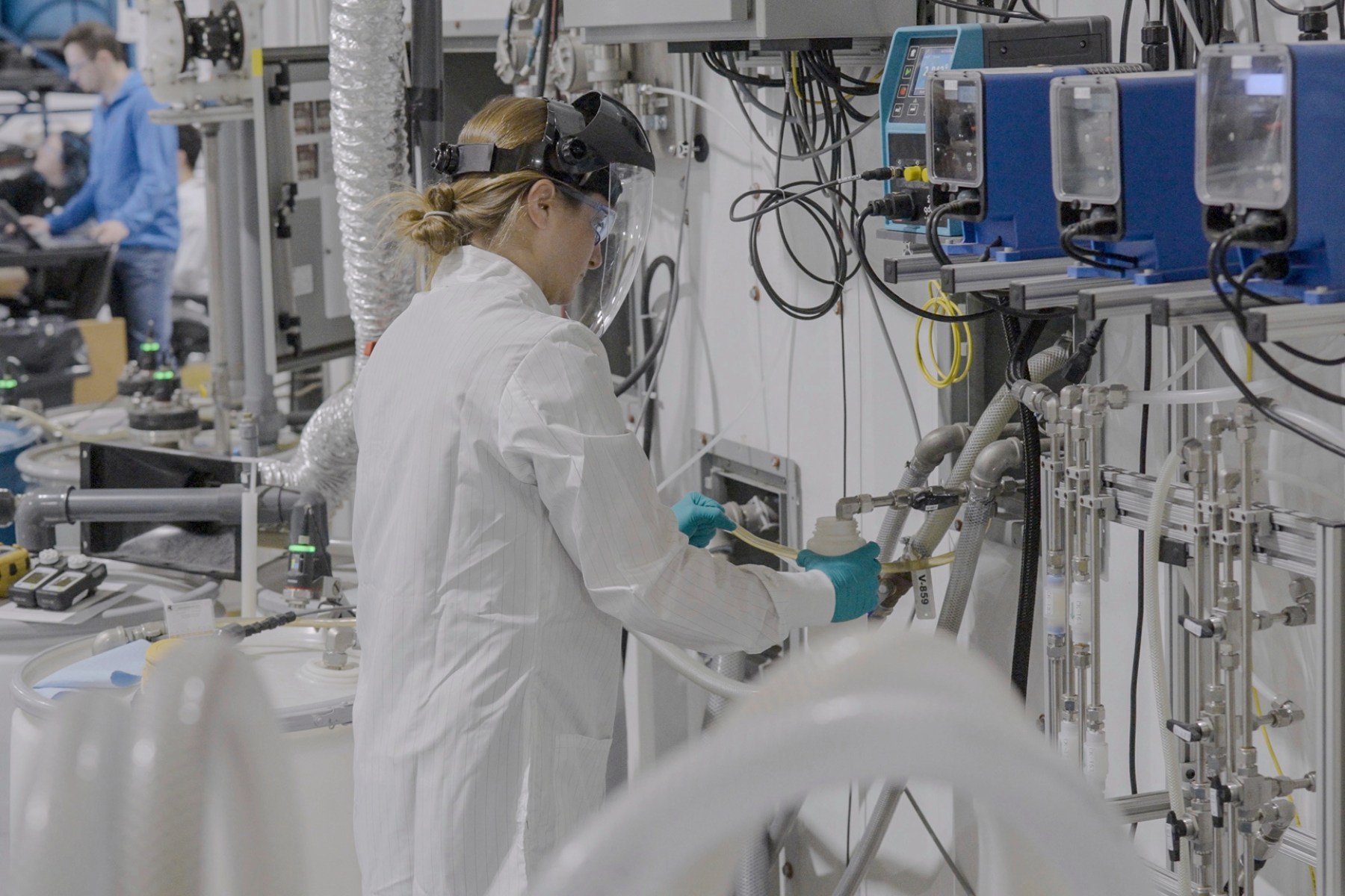Researcher operating scientific equipment