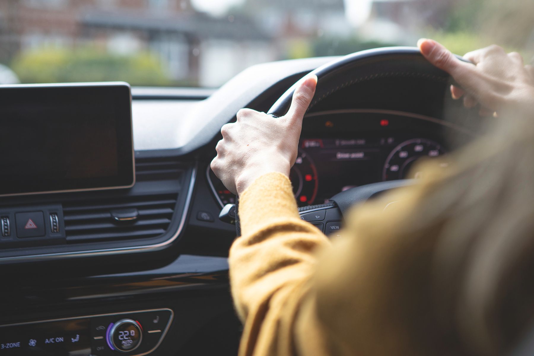 A person driving a car