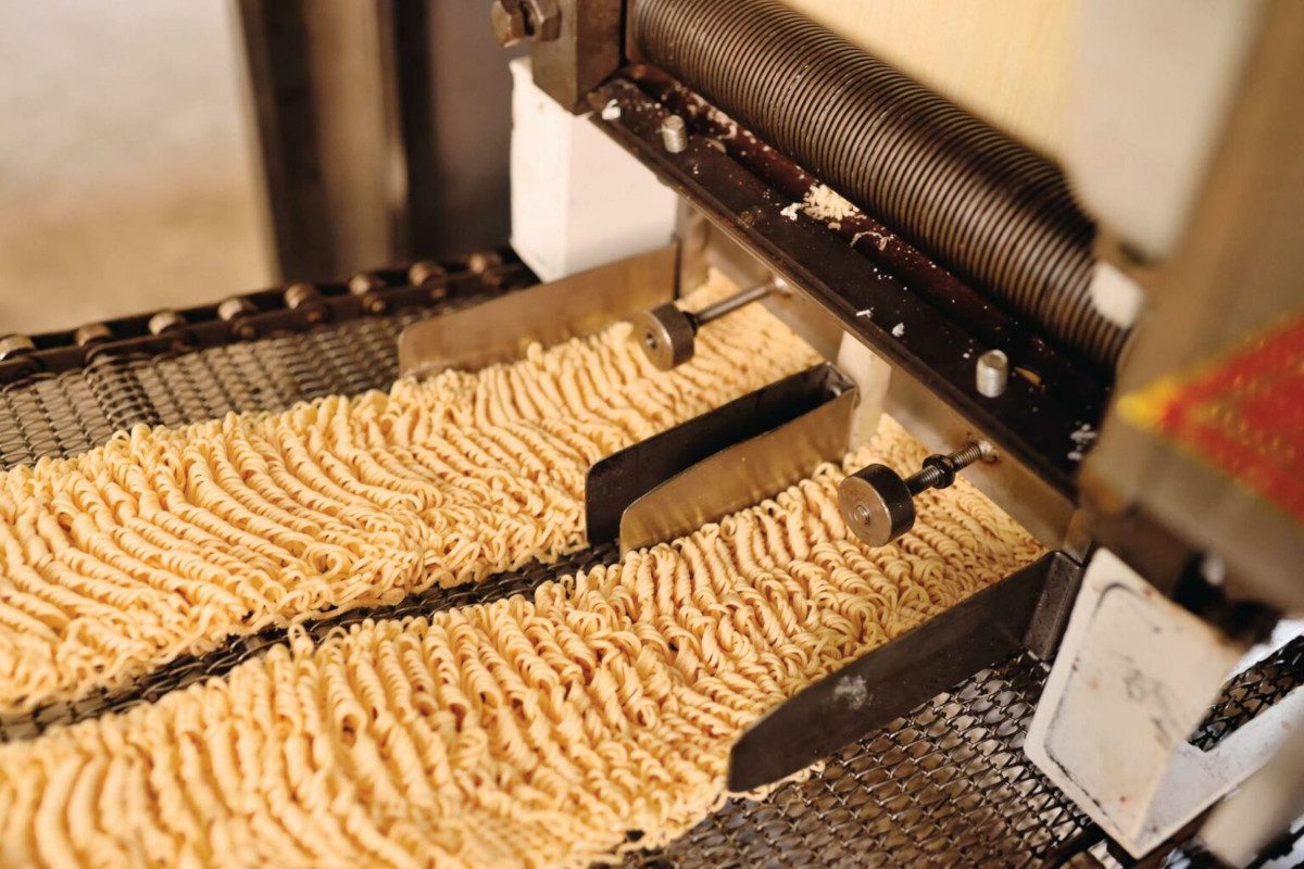 Photo of dried noodles being produced in a factory